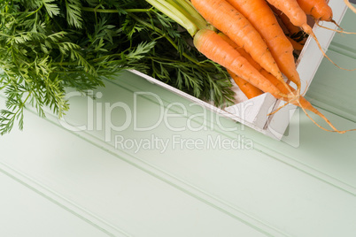 Carrots on wooden table