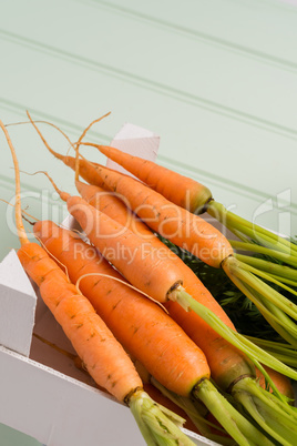 Carrots on wooden table