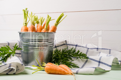 Carrots on wooden table