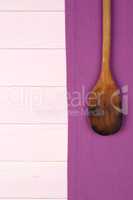 Kitchenware on purple towel