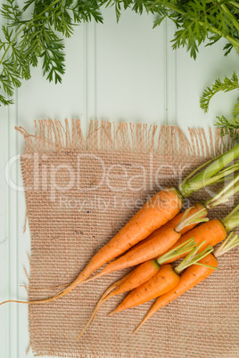 Carrots on wooden table