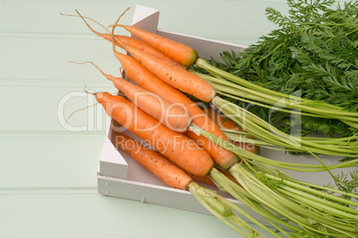 Carrots on wooden table