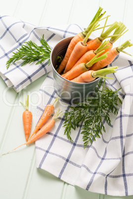 Carrots on wooden table