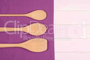 Kitchenware on purple towel