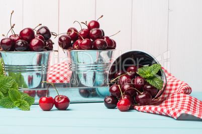 Cherries in blue wooden table