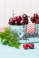 Cherries in blue wooden table