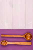 Kitchenware on purple towel