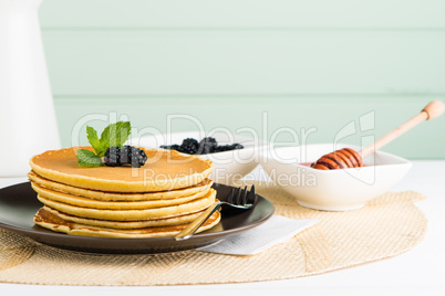 Pancakes with fresh blackberries