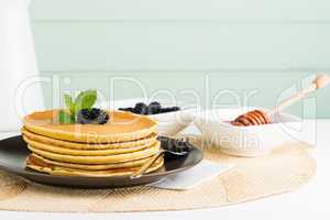 Pancakes with fresh blackberries