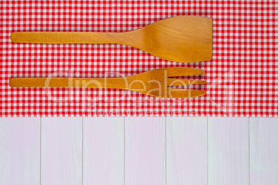 Kitchenware on red towel