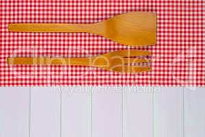 Kitchenware on red towel