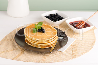 Pancakes with fresh blackberries