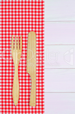 Kitchenware on red towel