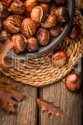 Roasted chestnuts and leaves