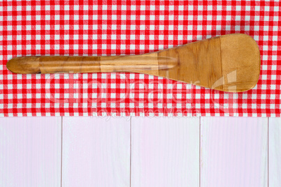 Kitchenware on red towel