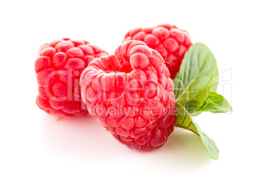 Ripe raspberry with leaf