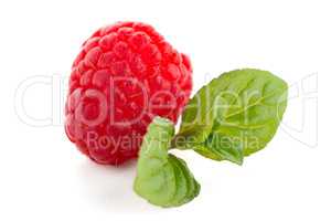 Ripe raspberry with leaf