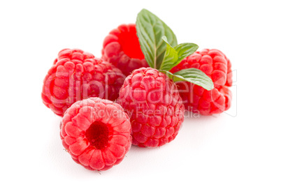 Ripe raspberry with leaf