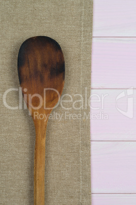 Kitchenware on beige towel