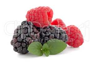 Raspberries and blackberry with mint leaf