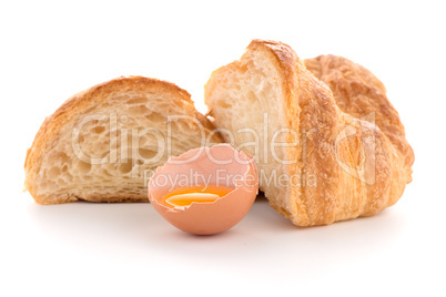 Croissant and raw egg