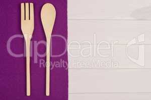 Kitchenware on purple towel
