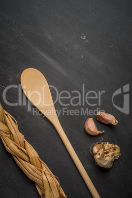 Wooden spoon and garlic