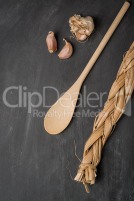 Wooden spoon and garlic