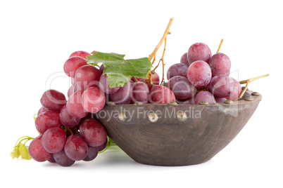 Fresh red grapes in wood bown