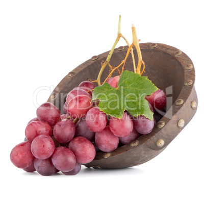 Fresh red grapes in wood bown