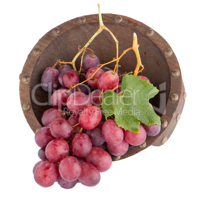 Fresh red grapes in wood bown