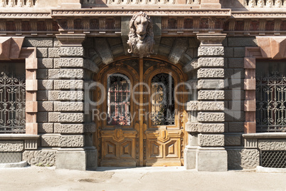 Ornamented wood ancient door. Old decoration of metal of the door photo.