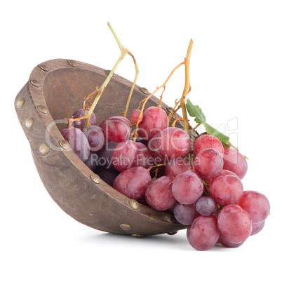 Fresh red grapes in wood bown