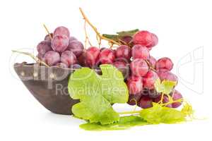 Fresh red grapes in wood bown