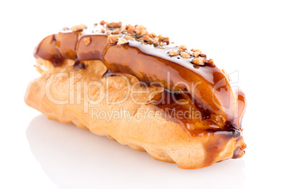 Eclair with caramel decoration