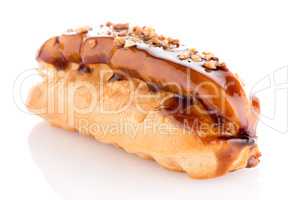 Eclair with caramel decoration