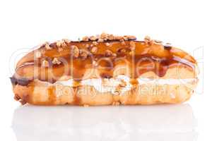 Eclair with caramel decoration