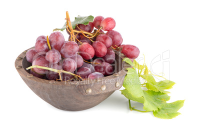 Fresh red grapes in wood bown