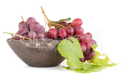 Fresh red grapes in wood bown