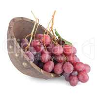 Fresh red grapes in wood bown