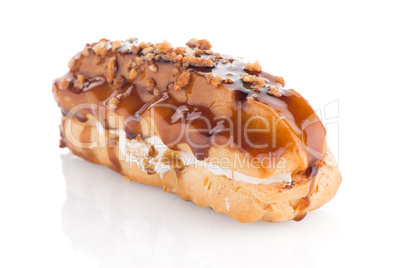 Eclair with caramel decoration