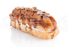 Eclair with caramel decoration