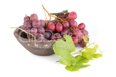 Fresh red grapes in wood bown