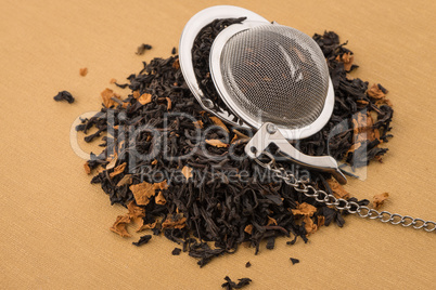 Black dry tea with petals