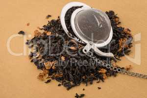 Black dry tea with petals