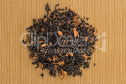 Black dry tea with petals