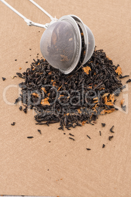 Black dry tea with petals