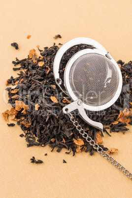 Black dry tea with petals