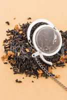 Black dry tea with petals