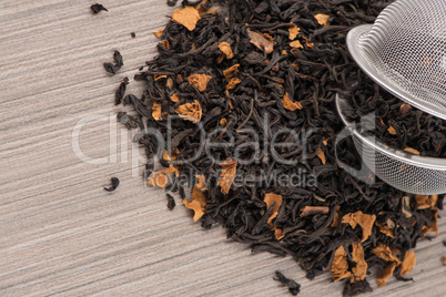 Black dry tea with petals